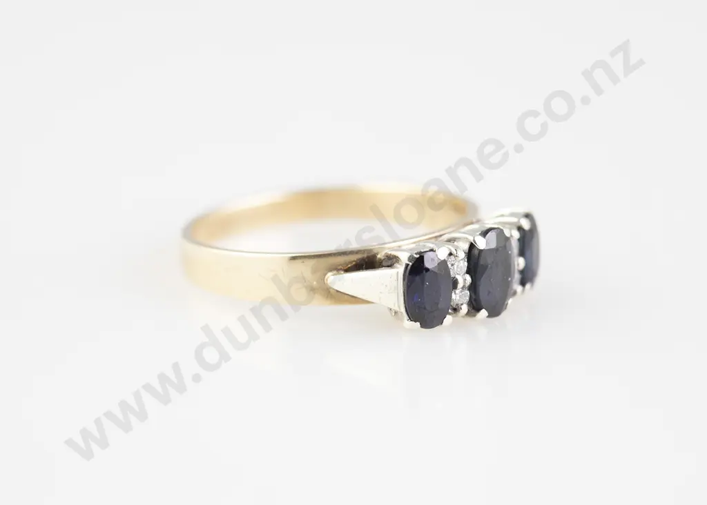9ct Seven Stone Sapphire and Diamond Bridge Ring Image 1++