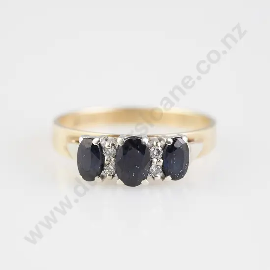 9ct Seven Stone Sapphire and Diamond Bridge Ring