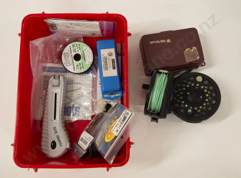 Small Box Of Fishing Accessories And Two Rods Image 1++