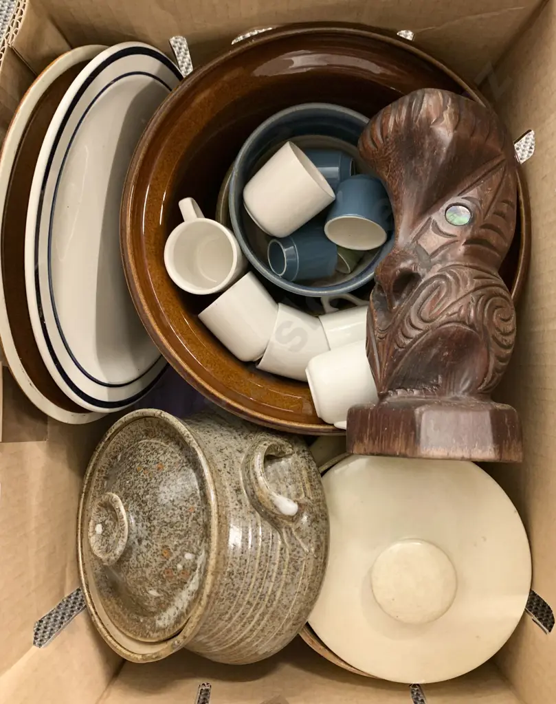 Box Of Crockery And Wooden Tiki Ornaments Image 1++