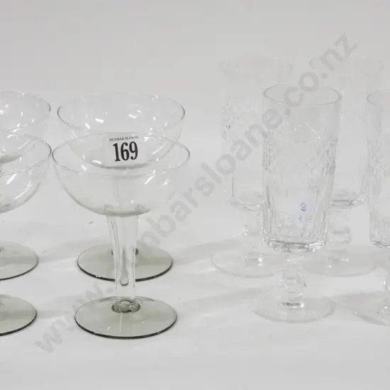 Five Crystal Champagne Flutes Together With Four Hollow-Stemmed Champagne Glasses