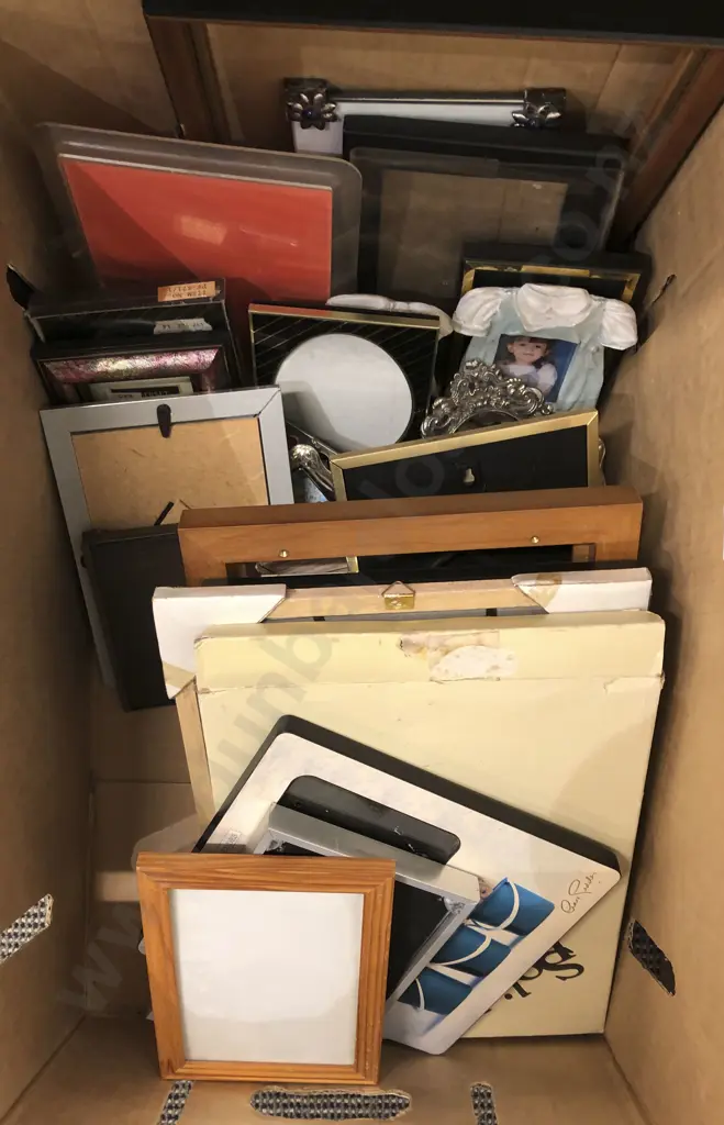 Two Boxes Of Assorted Including Frames And Doll Costumes Image 1++