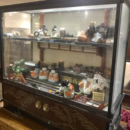 Glazed Display of Japanese Dolls and Accessories