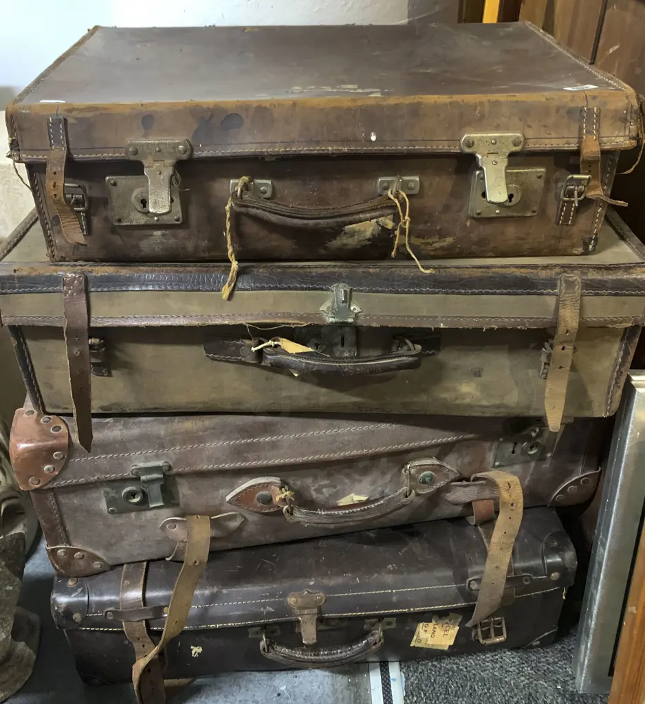 Four Vintage Leather Suitcases Image 1++
