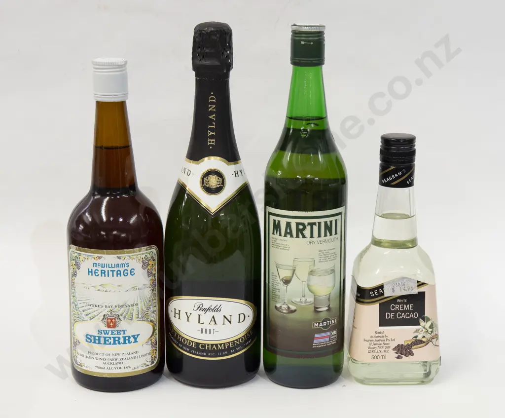 Four Various Bottles of Alcohol Image 1++