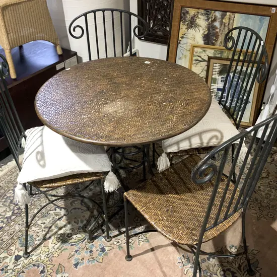 Circular Outdoor Table Together With Four Chairs