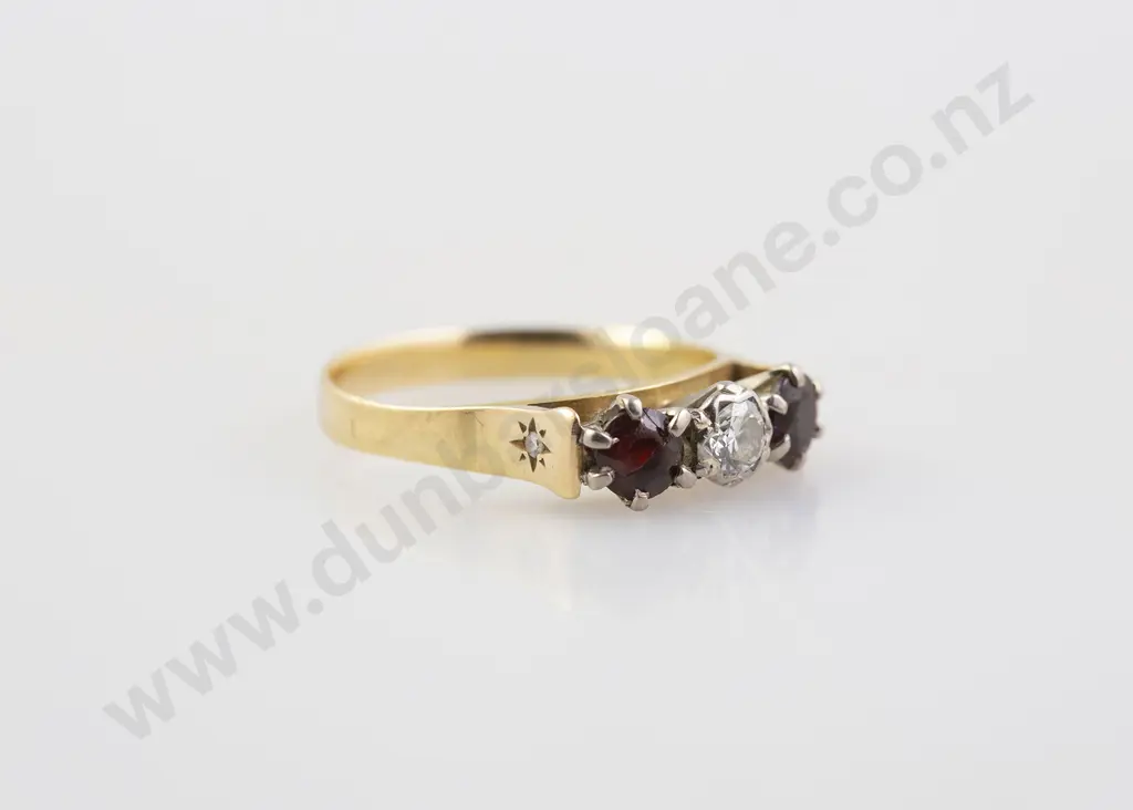 18ct Three Stone Diamond and Garnet Bridge Ring Image 1++