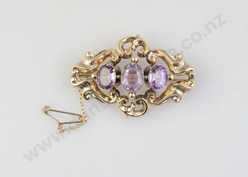 Victorian 9ct Three Stone Amethyst Lozenge Scroll Brooch Image 1++