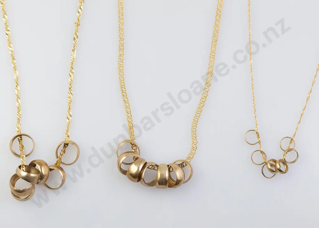 Two 9ct Seven 'Lucky Rings' Pendant Necklaces Image 1++