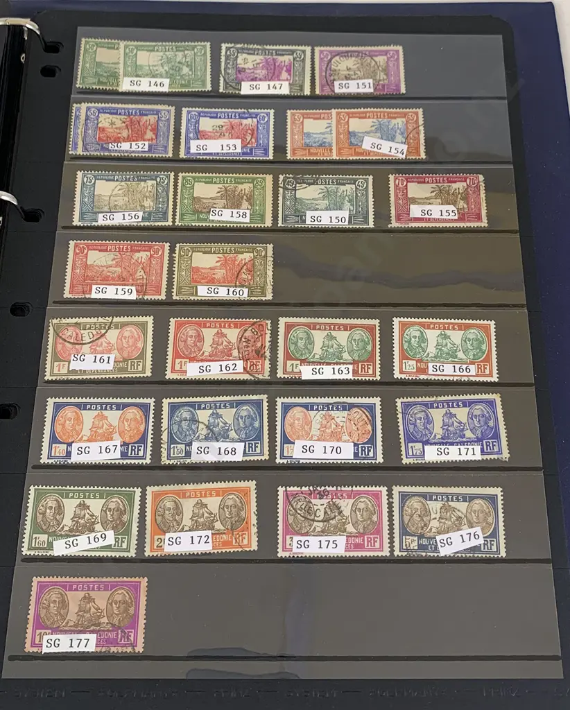 Two World Stock Book Albums Image 1++