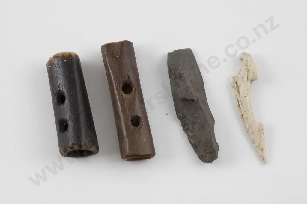 Two Bone toggles, a small chisel and a bone fishhook shank Image 1++