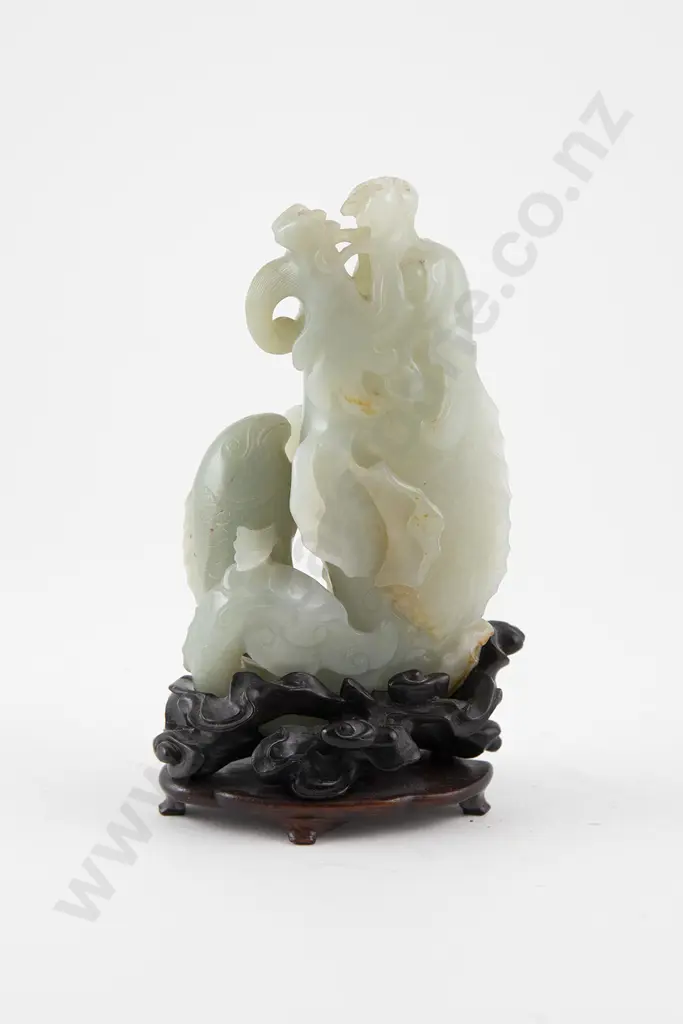 Chinese Celadon Jade Dragon Raised on a fitted stand Image 1++