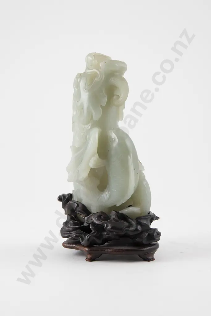 Chinese Celadon Jade Dragon Raised on a fitted stand Image 1++