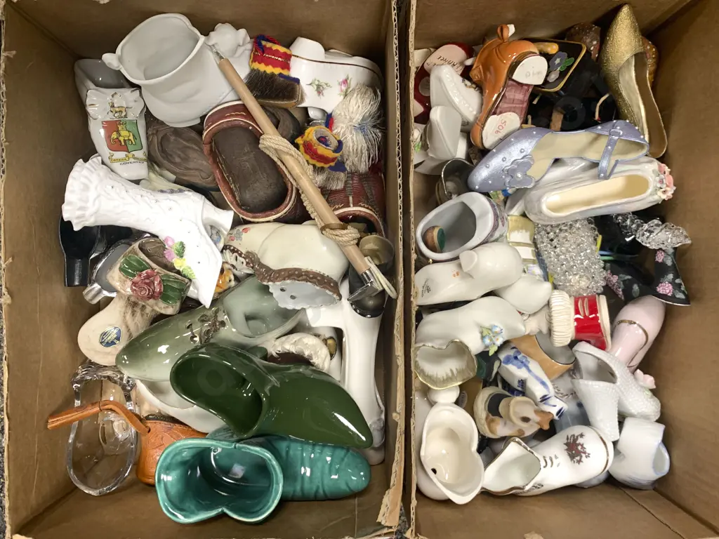Two Boxes of Assorted Shoe Ornaments Image 1++