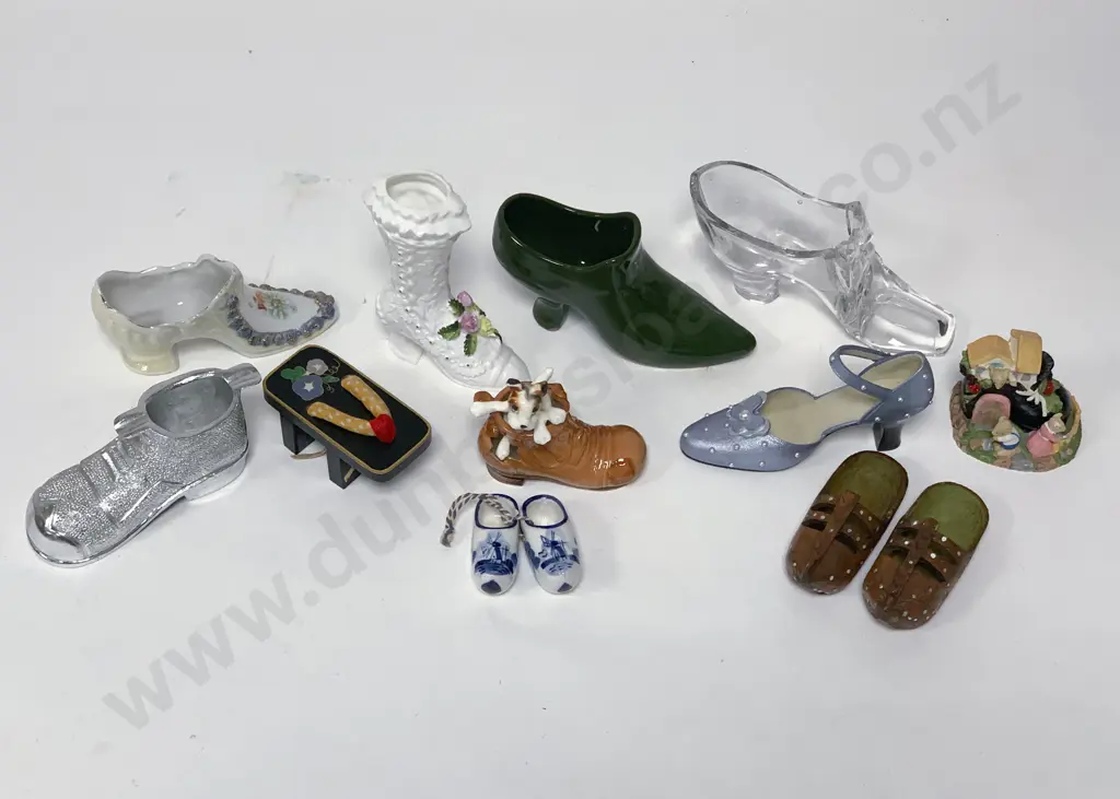 Two Boxes of Assorted Shoe Ornaments Image 1++