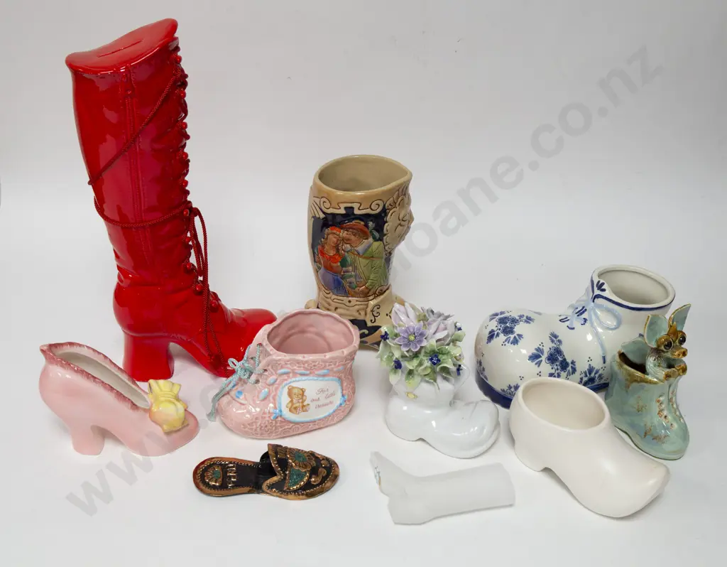 Two Boxes of Assorted Shoe Ornaments Image 1++