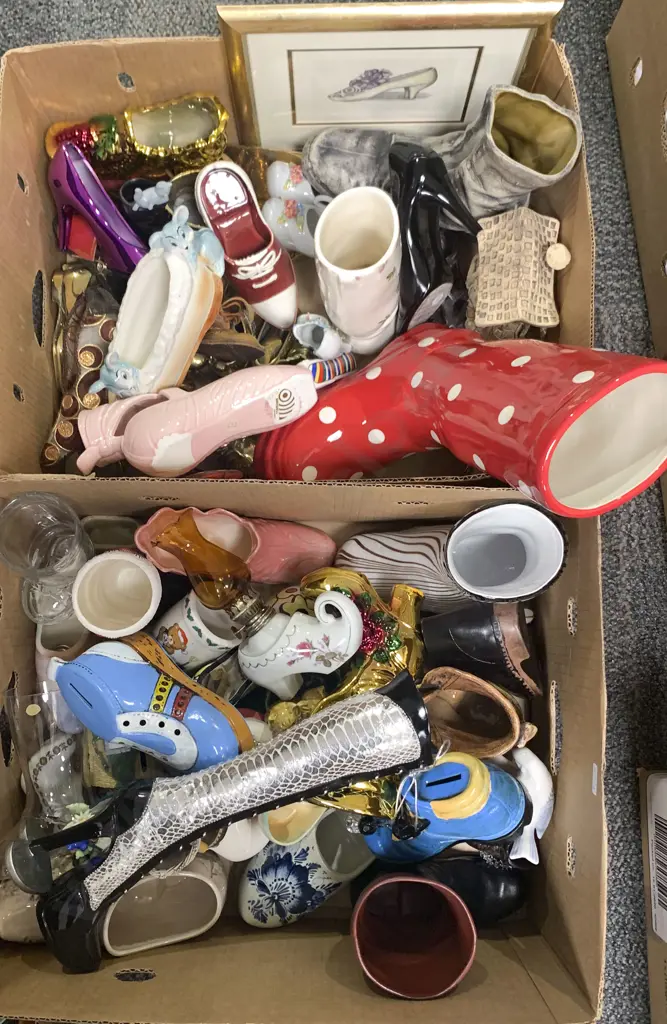 Two Boxes of Assorted Shoe Ornaments Image 1++