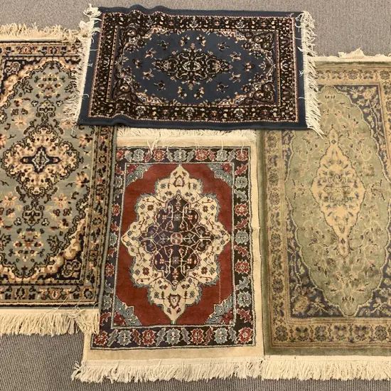 Four Machine Made Persian Style Floor Mats