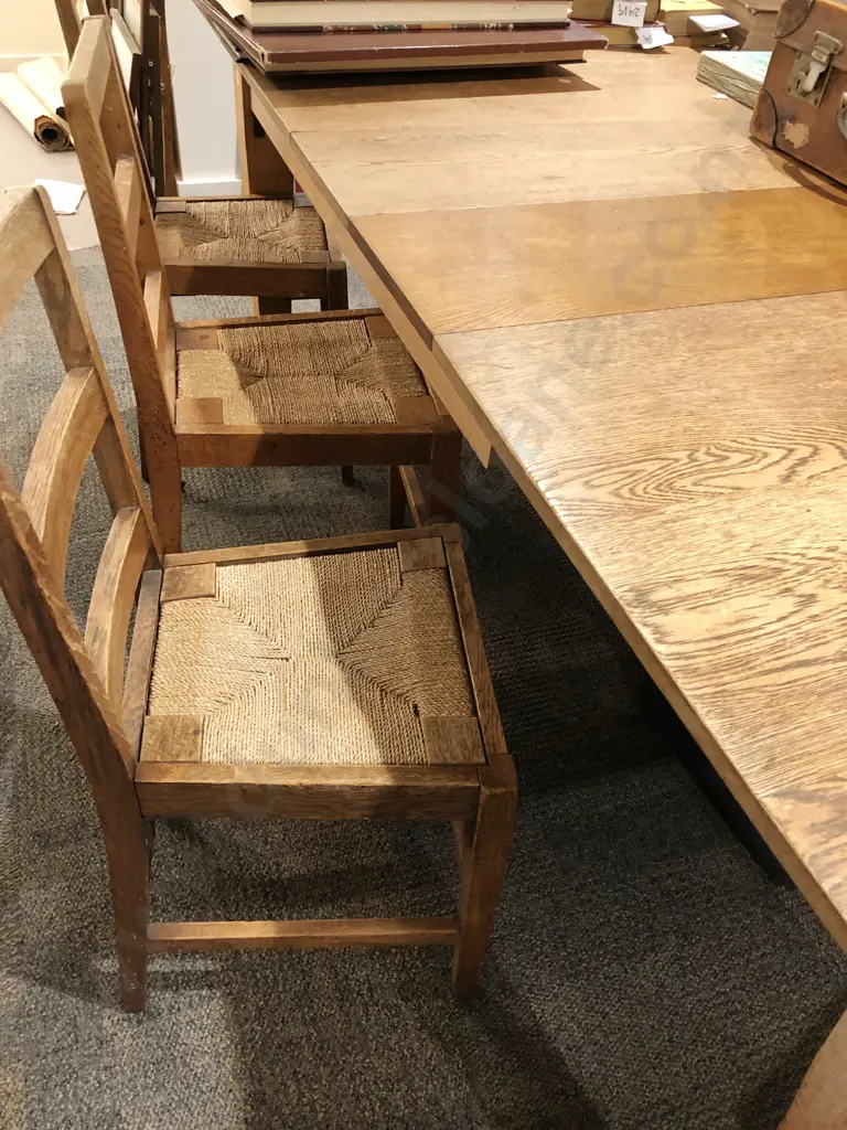 Edwardian Oak Extension Dining Table and Seven Rush Seat Chairs Image 1++