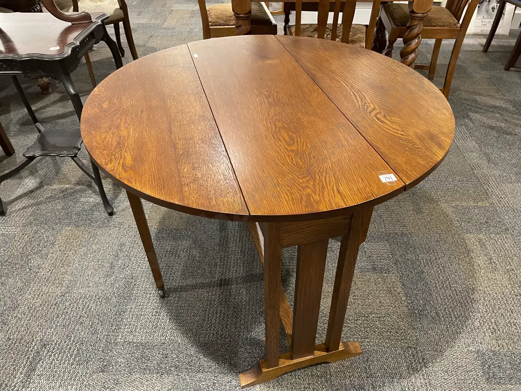 Oak Oval Drop Leaf Dining Table Image 1++