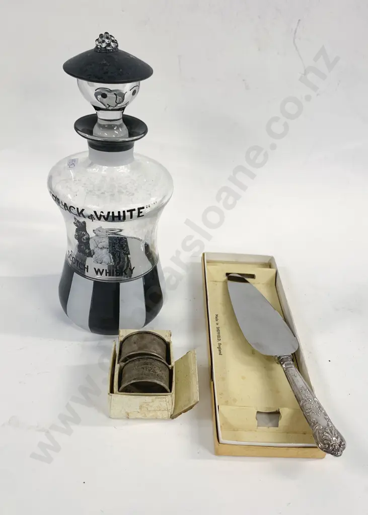 Black and White Scotch Whisky Decanter Together With Pair of Sterling Silver Napkin Rings and Slice Image 1++