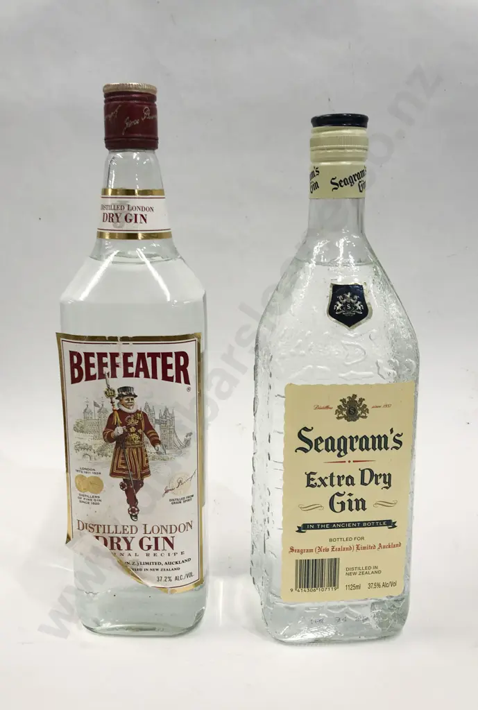 Beefeater Distilled London Dry Gin 1.125L Together With Seagram's Extra Dry Gin 1.125L Image 1++