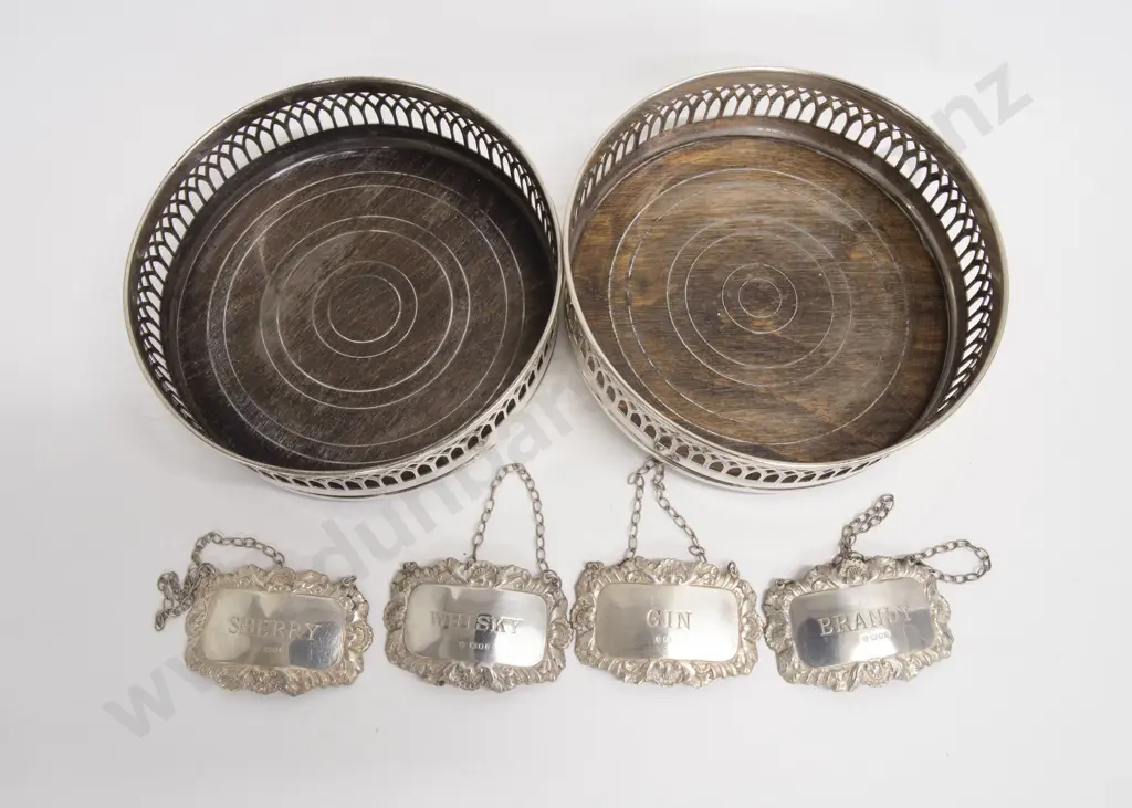 Two Wine Coasters together with Four Sterling Silver Decanter Labels Image 1++