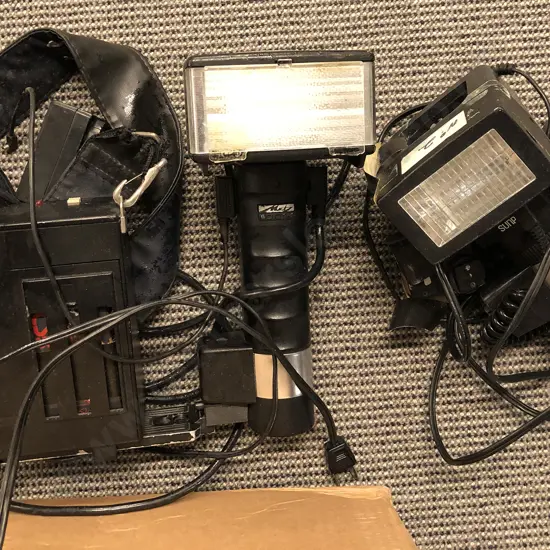 Box of Camera Accessories incl. Flashers