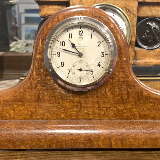 Chrome Cased Timepiece on Riwariwa Stand