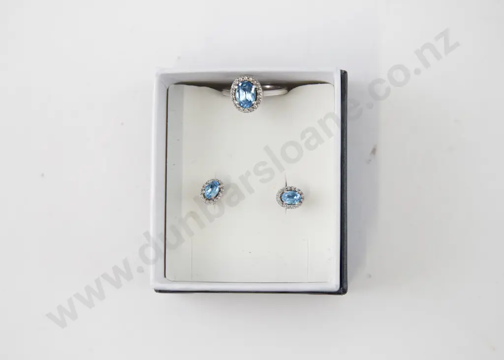 S/S Topaz Ring and matching earrings Image 1++