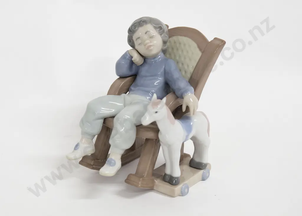 Lladro Figure of Boy in Rocking Chair with Toy Horse Image 1++