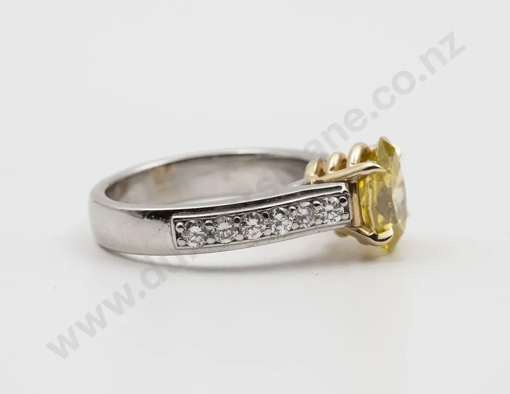 Platinum and 18ct Solitaire Fancy Yellow Diamond Ring Image 1++