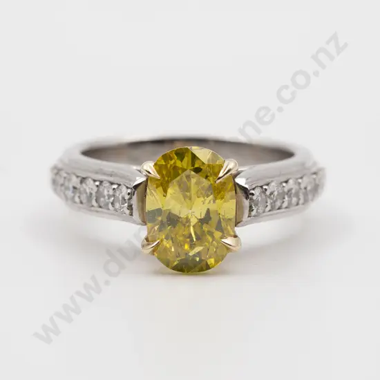 Platinum and 18ct Solitaire Fancy Yellow Diamond Ring