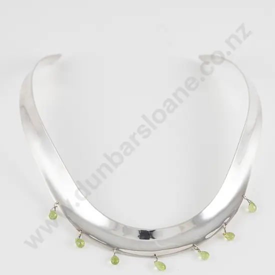 The Village Goldsmith S/S & Seven Stone Peridot Torque Collar