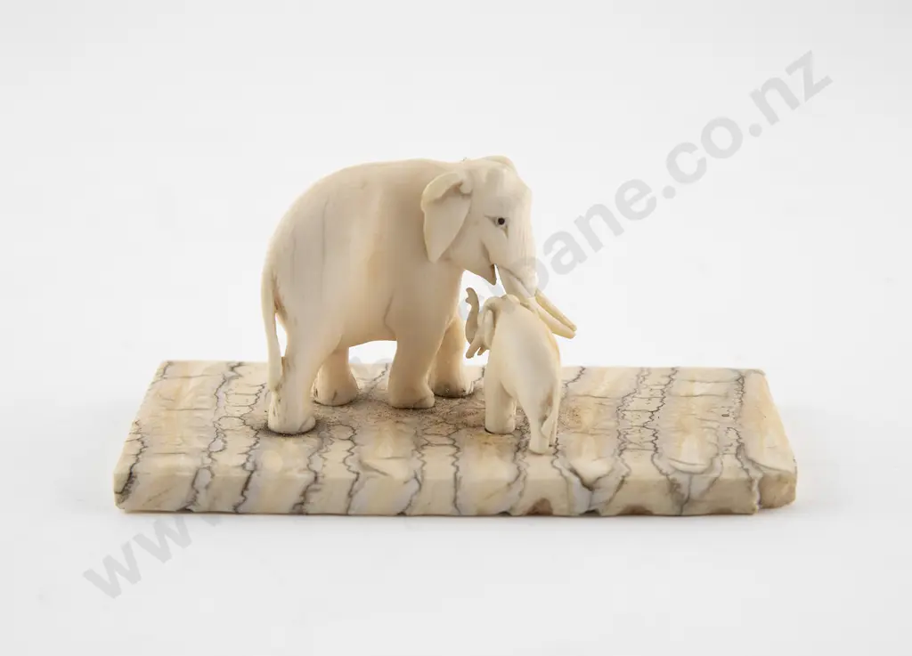 Two Small Carved Ivory Elephants On Mammoth Tooth Base Image 1++