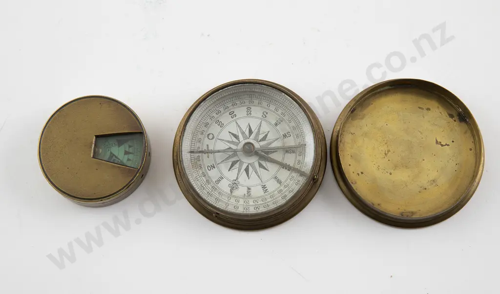 Two Small Circular Brass Cased Compasses Image 1++