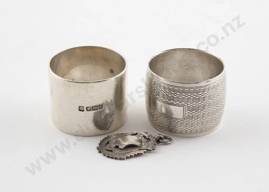 Two S/S Circular Napkin Rings Image 1++