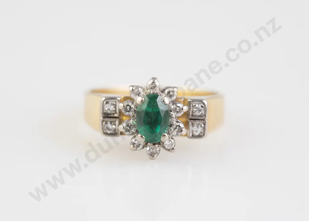 18ct Eleven Stone Synthetic Emerald and Diamond Cluster Ring Image 1++