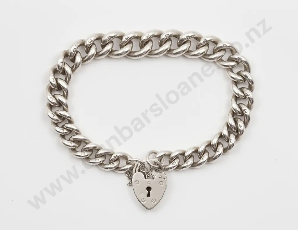 Heavy S/S Slightly Graduated Curb Link Bracelet Image 1++