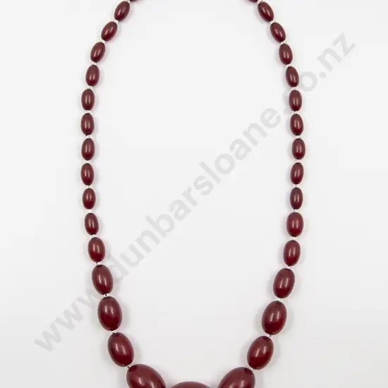 Edwardian Single Strand Graduated Lozenge Cherry Amber Bead Necklace