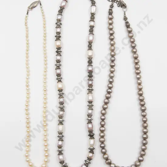 Three Pearl Necklaces