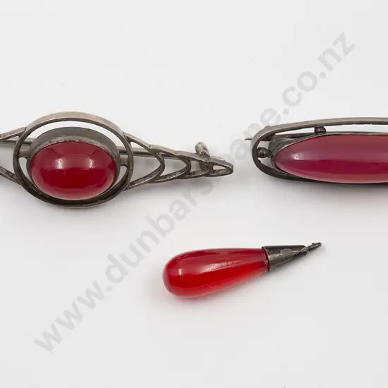 Two Art Nouveau Silver and Carnelian Brooches and Small Drop Pendant