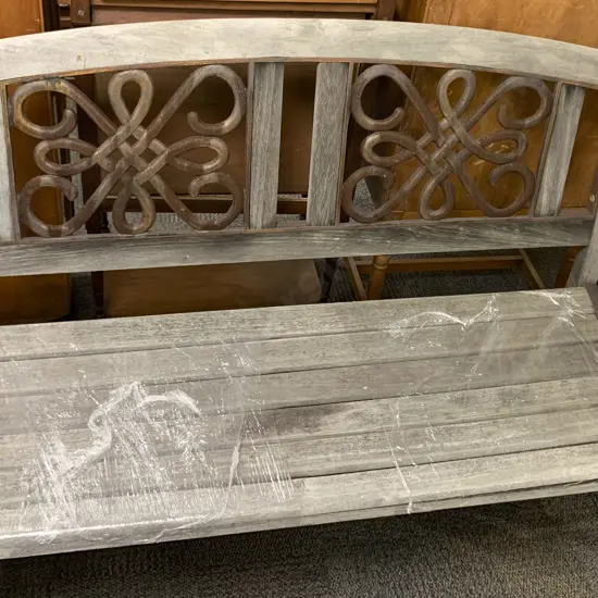 Outdoor Bench Seat With Wrought Metal Design to Back