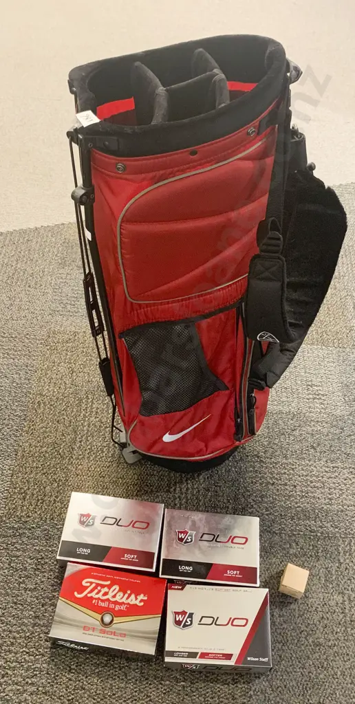 Golf Club Bag Together With Four Boxes of Golf Balls Image 1++