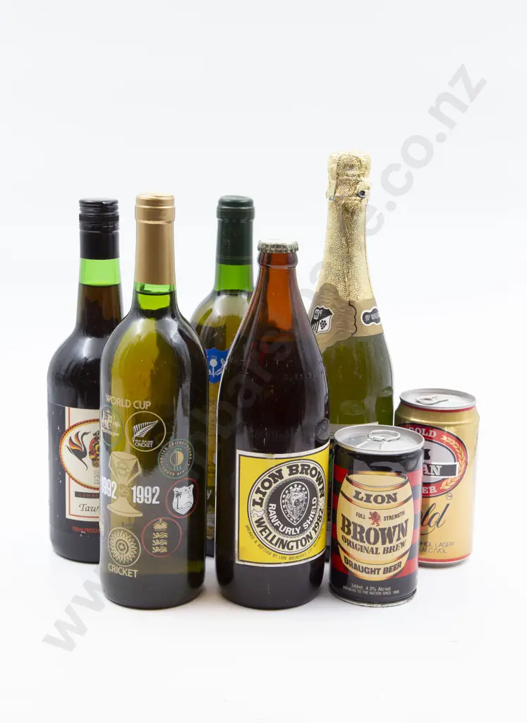 Five Bottles of Beer and Wine Together With Two Cans of Beer Image 1++
