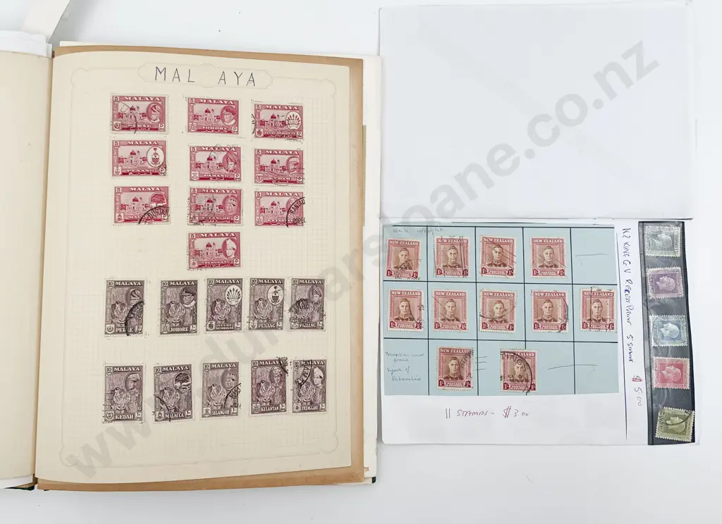 Two Albums of Stamps Including NZ Image 1++