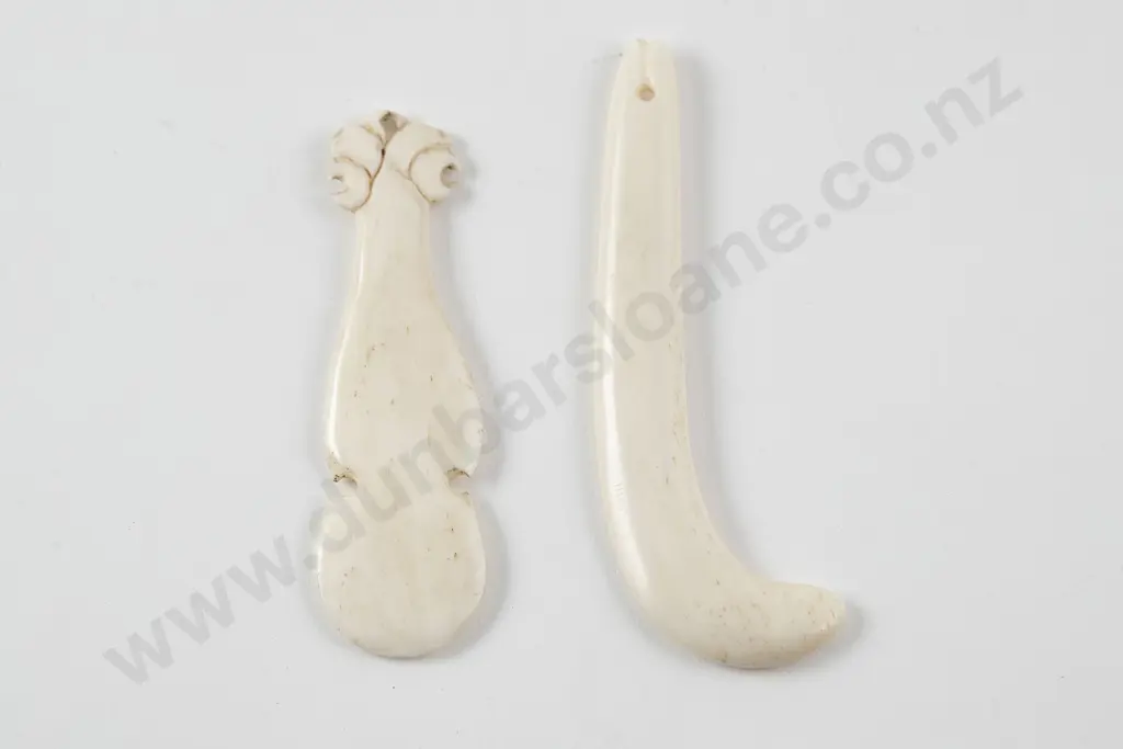 Two bone pendants Image 1++