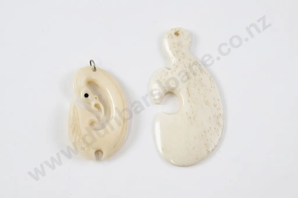 Two bone pendants Image 1++