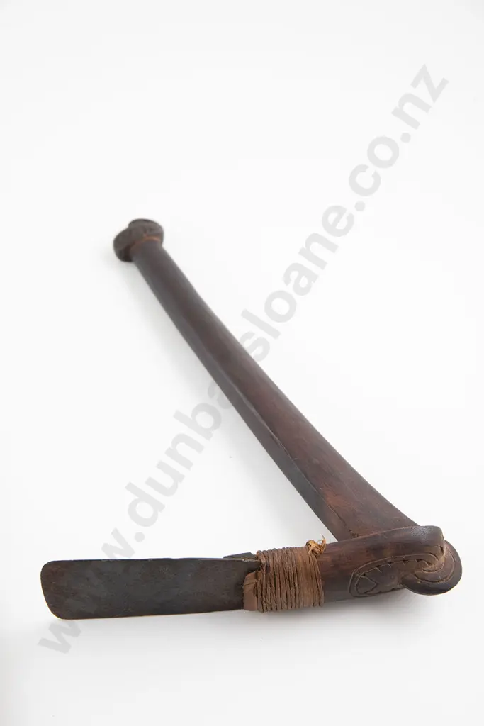 Hafted adze and two Pacific island combs Image 1++
