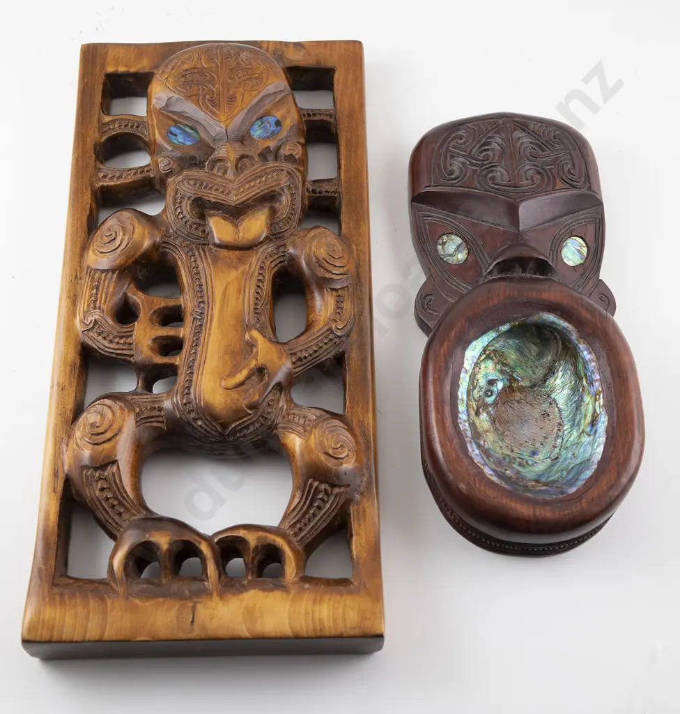 Carved panel with an ancestral figure and a carved wheku head Image 1++